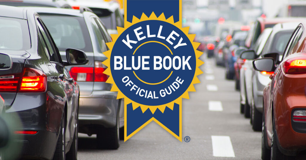 Two lanes of traffic, featuring the Kelley Blue Book label