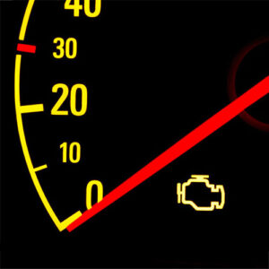 speedometer with yellow numbers; the check engine light is on