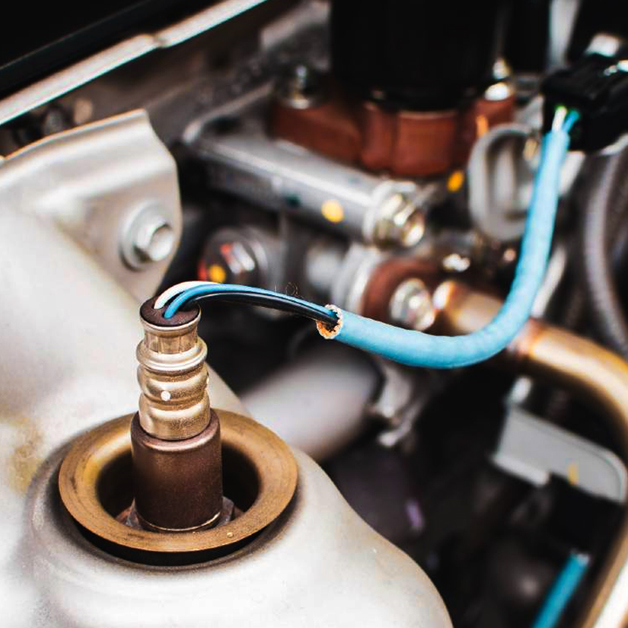 Close-up of a car's oxygen sensor